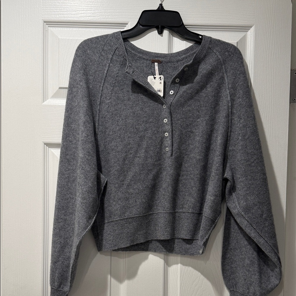 100% cashmere Free People dark grey sweater. Brand new with tag